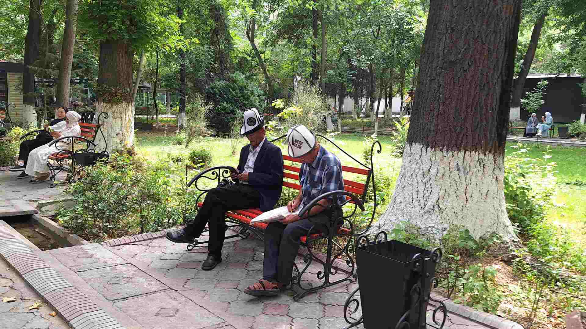 Local Kyrgyz men with traditional hats